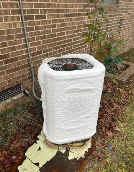 Outdoor condenser protected with a winter service cover